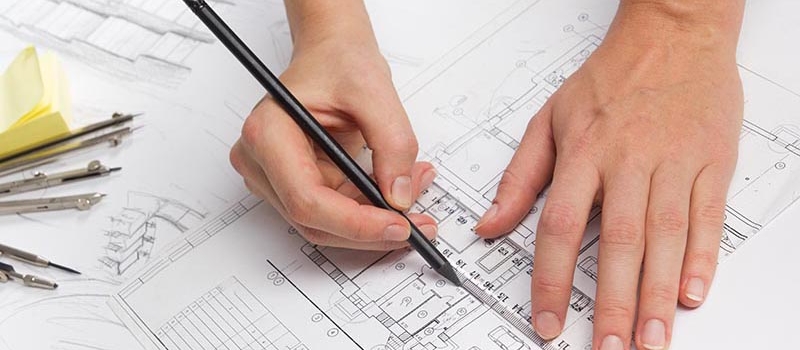 Architect working on blueprint. Architects workplace – architectural project, blueprints